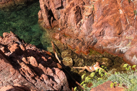 French Riviera vacation-woman swimming in small creek