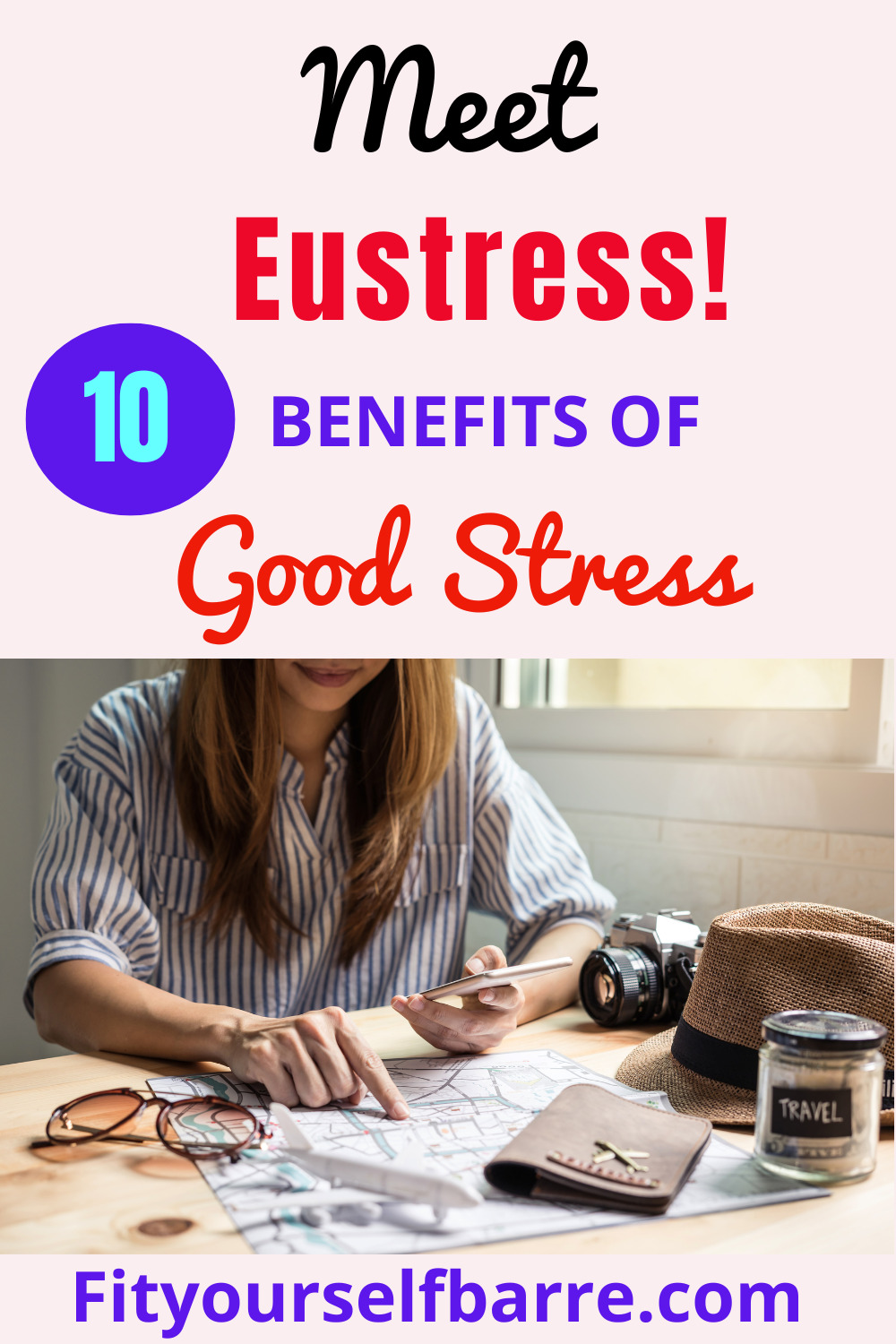 what is eustress-a smiling young women planning a vacation trip