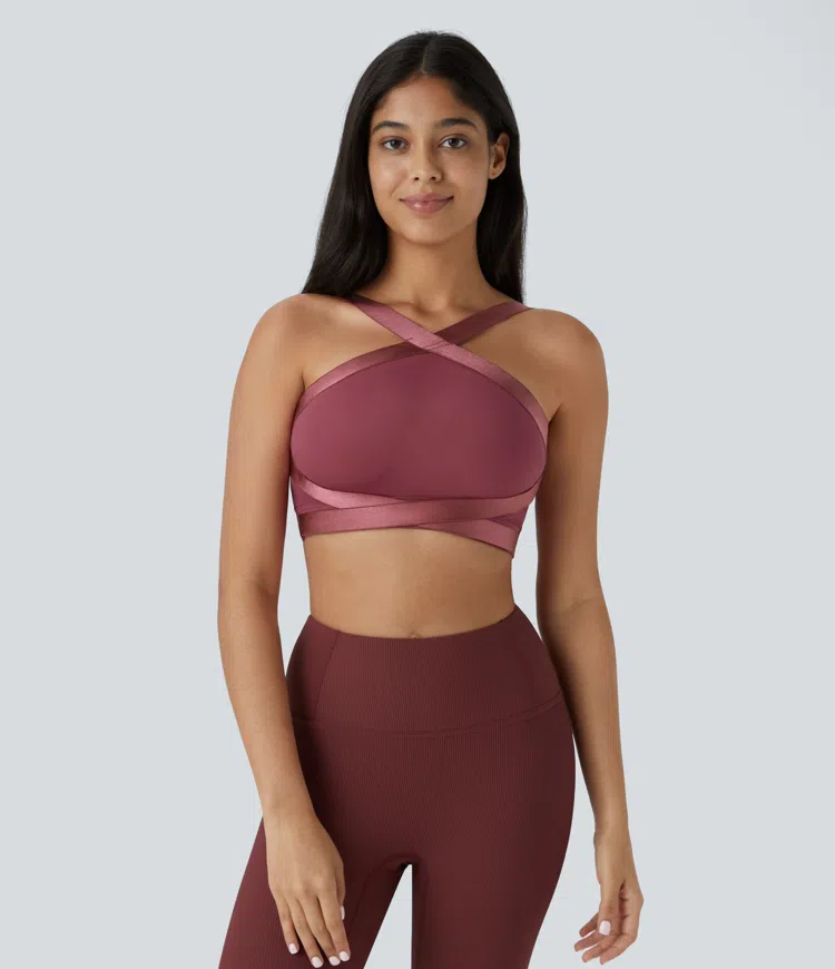 woman wearing a Ballet-style support workout burgandy sports bra